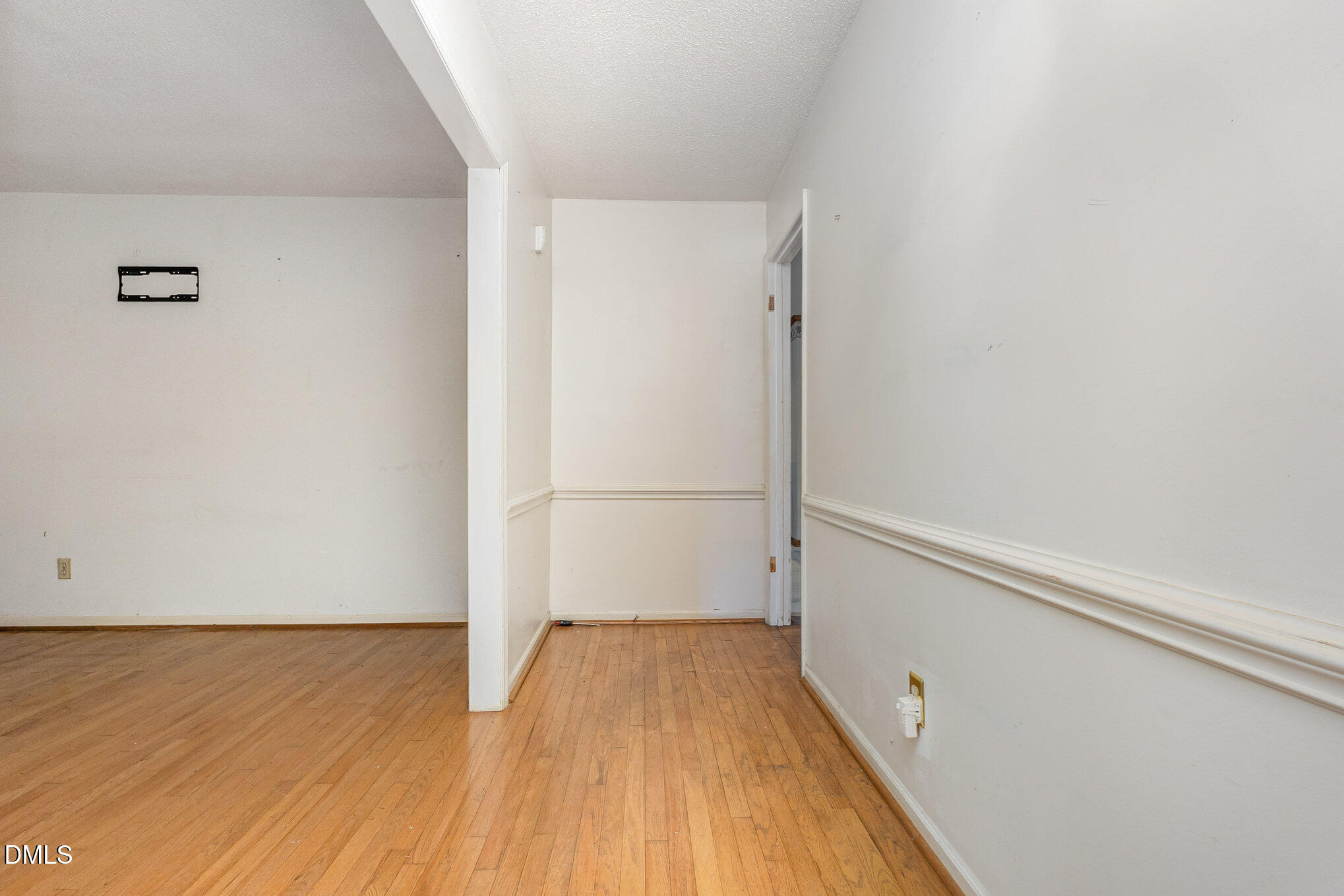 2111 Fieldcrest Road East Wilson, NC 27893 - Photo 26 of 37 a view of walk in closet with wooden floor