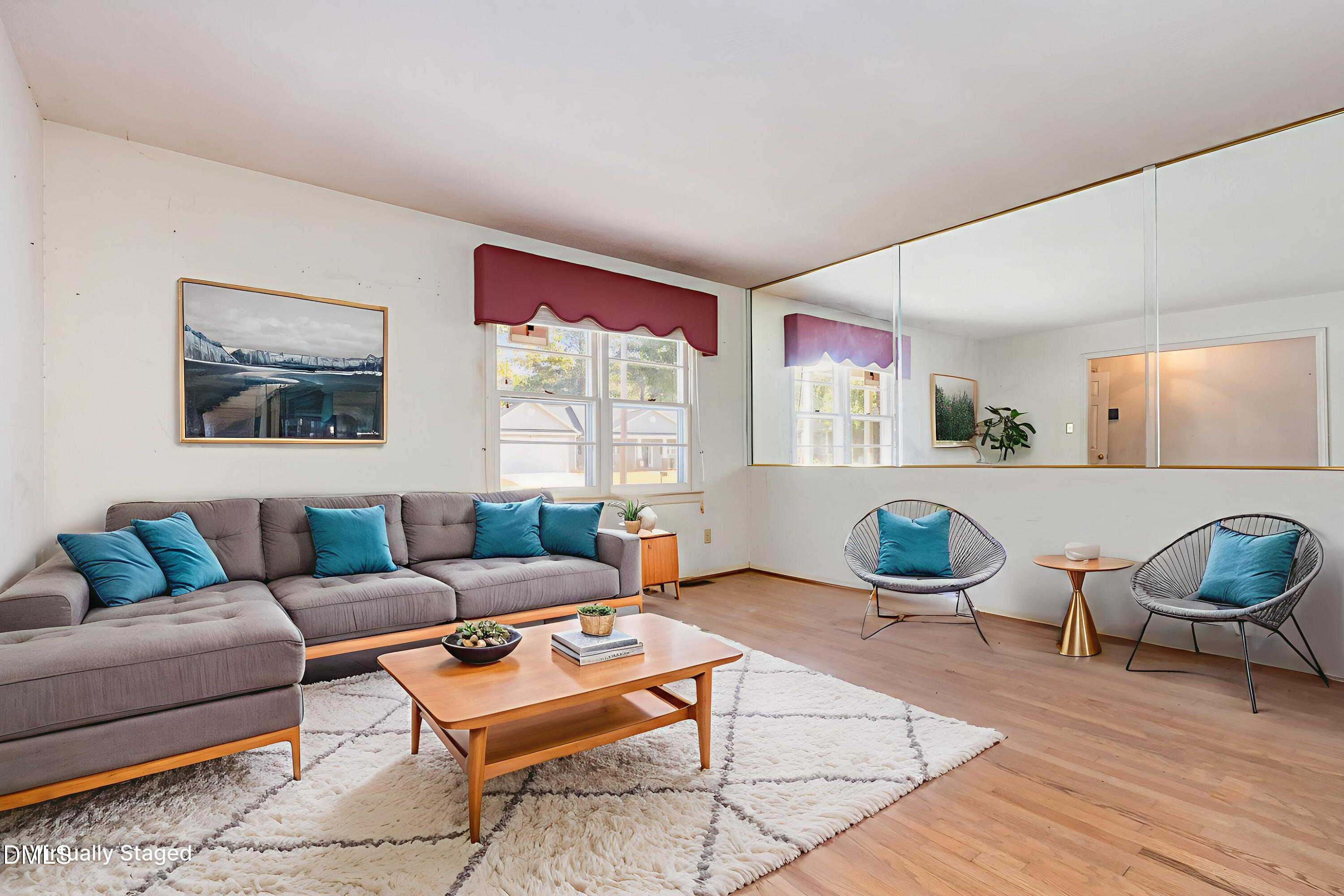 2111 Fieldcrest Road East Wilson, NC 27893 - Photo 28 of 37 a living room with furniture and a wooden floor