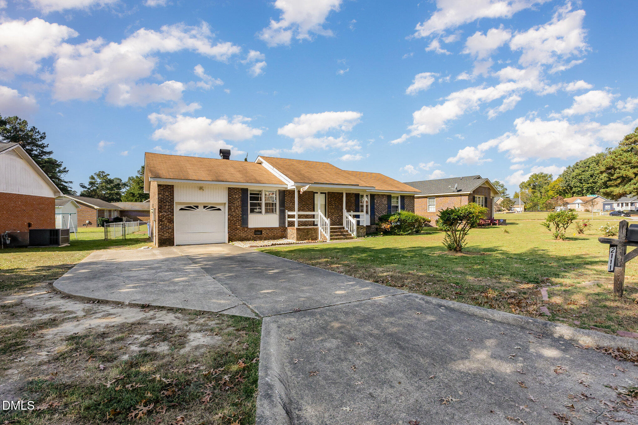 2111 Fieldcrest Road East Wilson, NC 27893 - Photo 2 of 37 a view of an house with backyard space and balcony