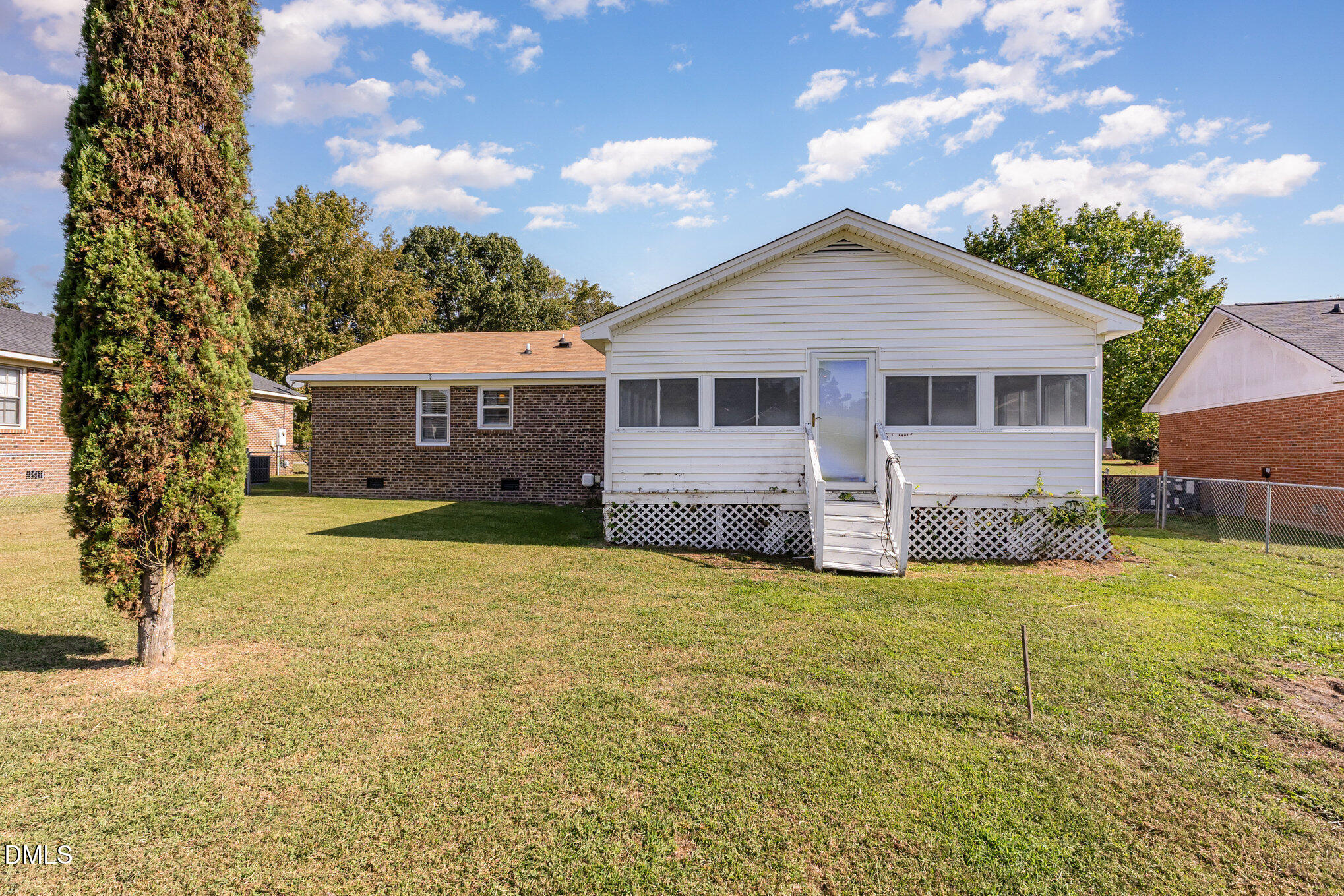 2111 Fieldcrest Road East Wilson, NC 27893 - Photo 33 of 37 a view of a house with a yard