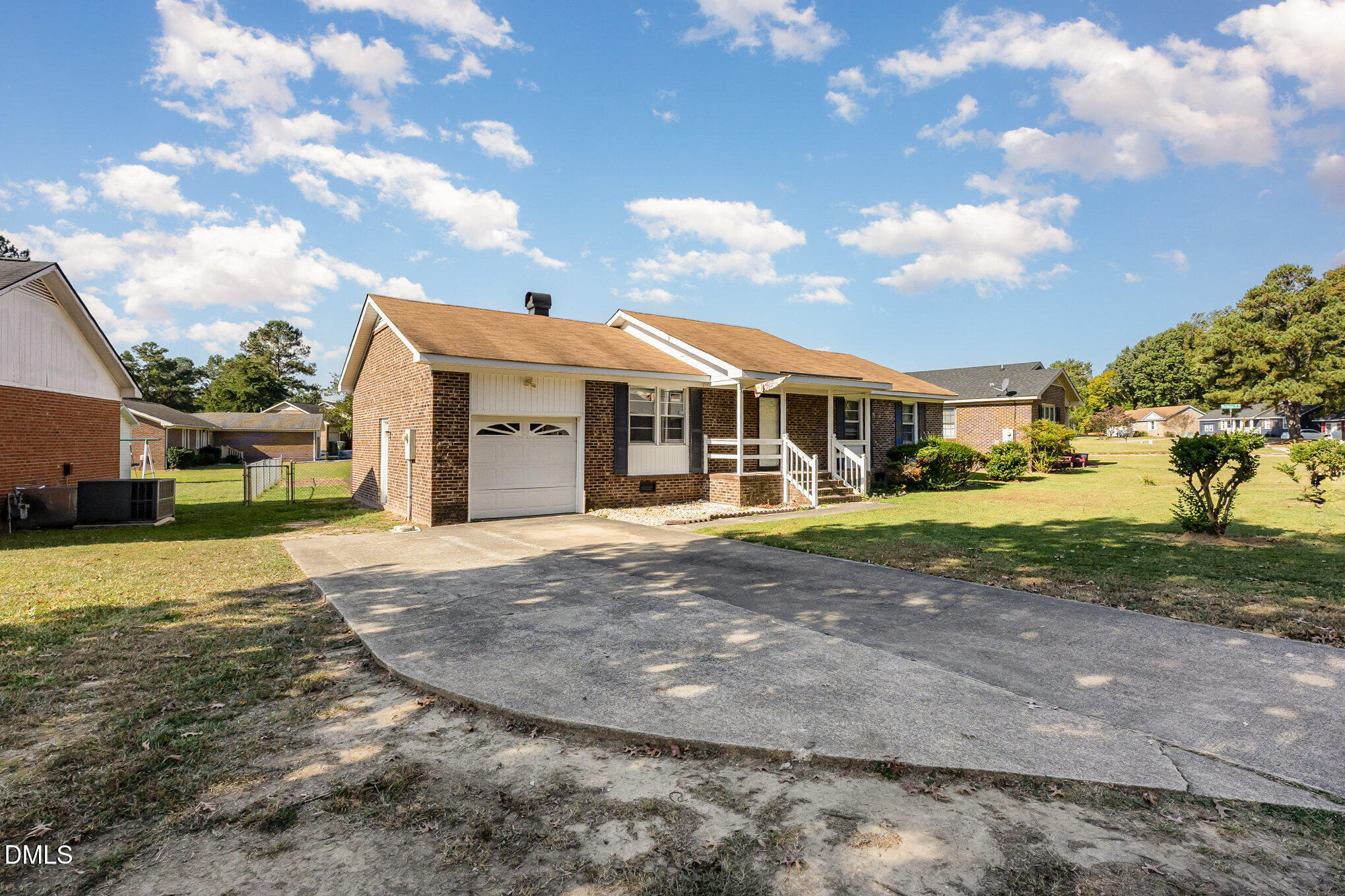 2111 Fieldcrest Road East Wilson, NC 27893 - Photo 3 of 37 a view of a house with a yard