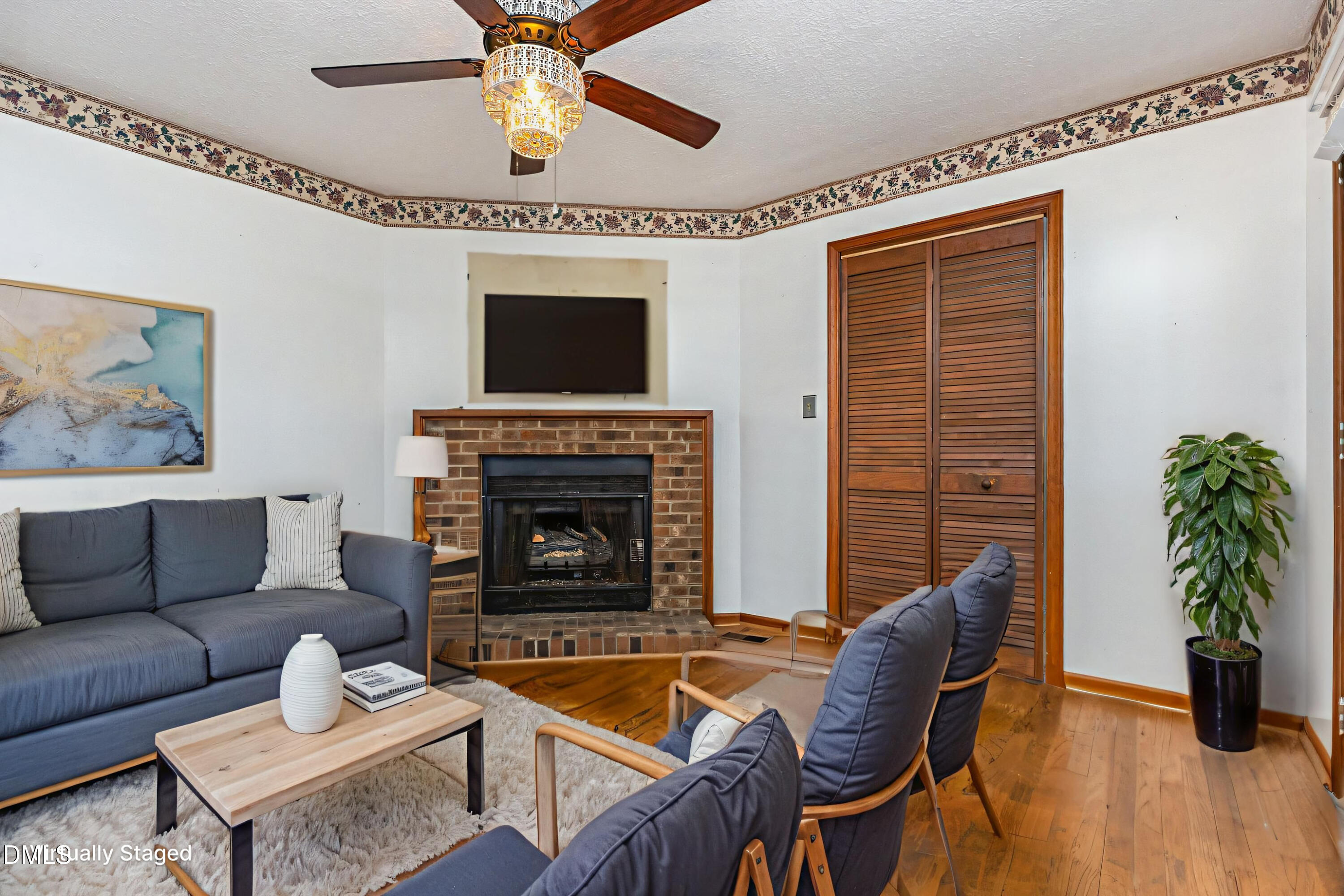 2111 Fieldcrest Road East Wilson, NC 27893 - Photo 9 of 37 a living room with furniture and a fireplace