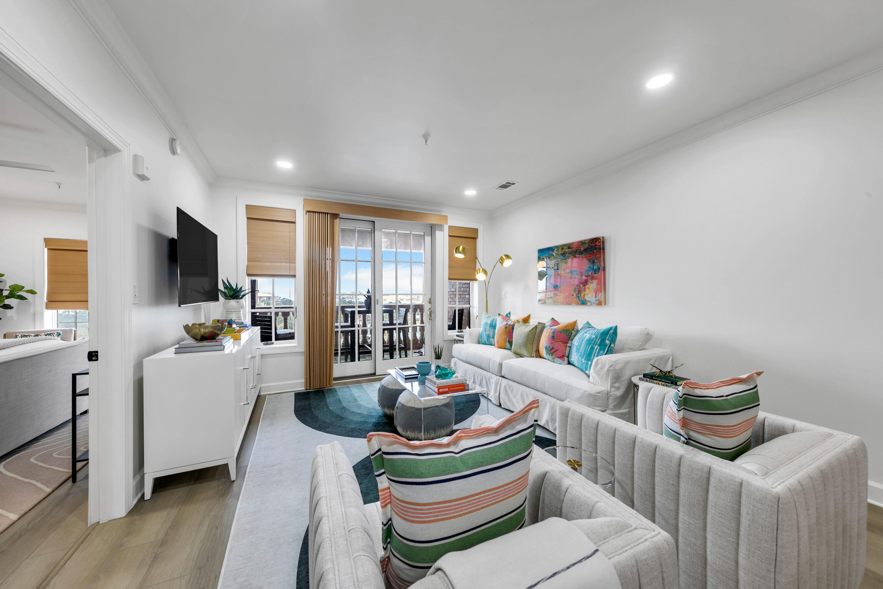 10343 East County Highway 30A, Unit E402 Inlet Beach, FL 32413 - Photo 2 of 34 a living room with furniture and a wooden floor