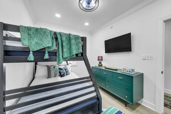 a view of living room with furniture and flat screen tv