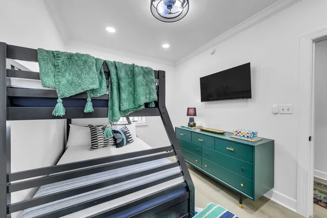 a view of living room with furniture and flat screen tv