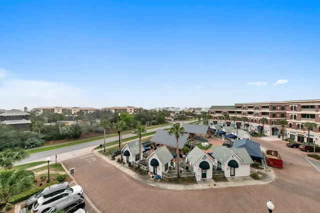 an aerial view of a house with roof deck