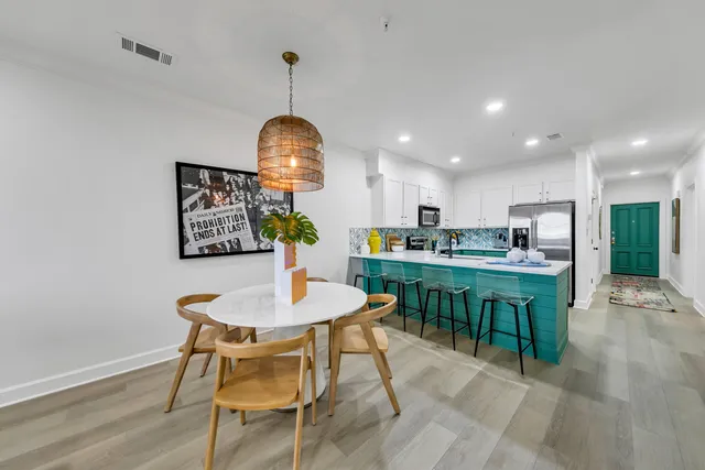 a view of a dining room with furniture