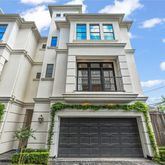 a front view of a house with a garage