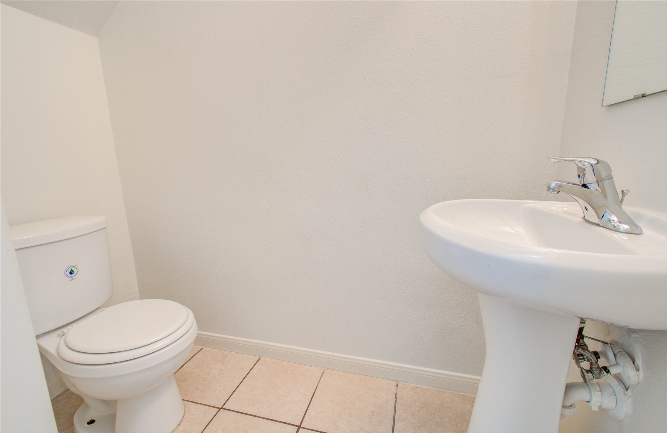 8218 Hall View Drive Houston, TX 77075 - Photo 15 of 31 a bathroom with a sink a toilet and mirror