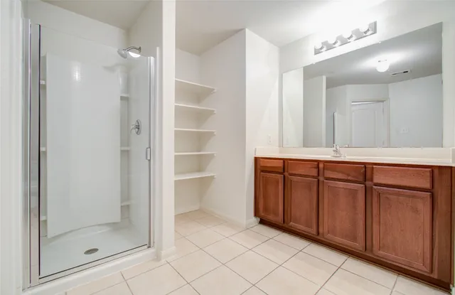 a bathroom with a bath tub
