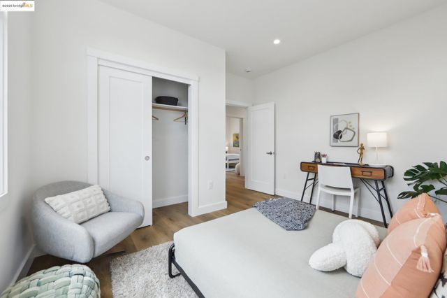 a bedroom with furniture and a couch