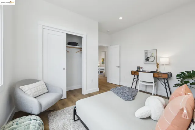 a bedroom with furniture and a couch