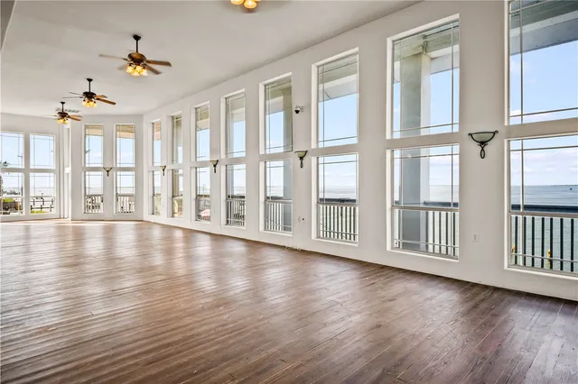 a view of living room with furniture and window