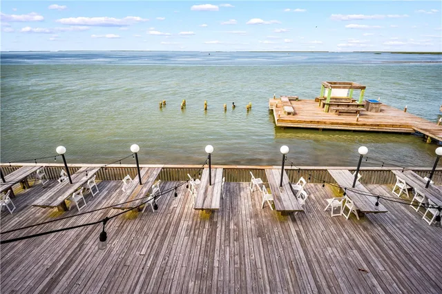 a white toilet sitting next to a white house