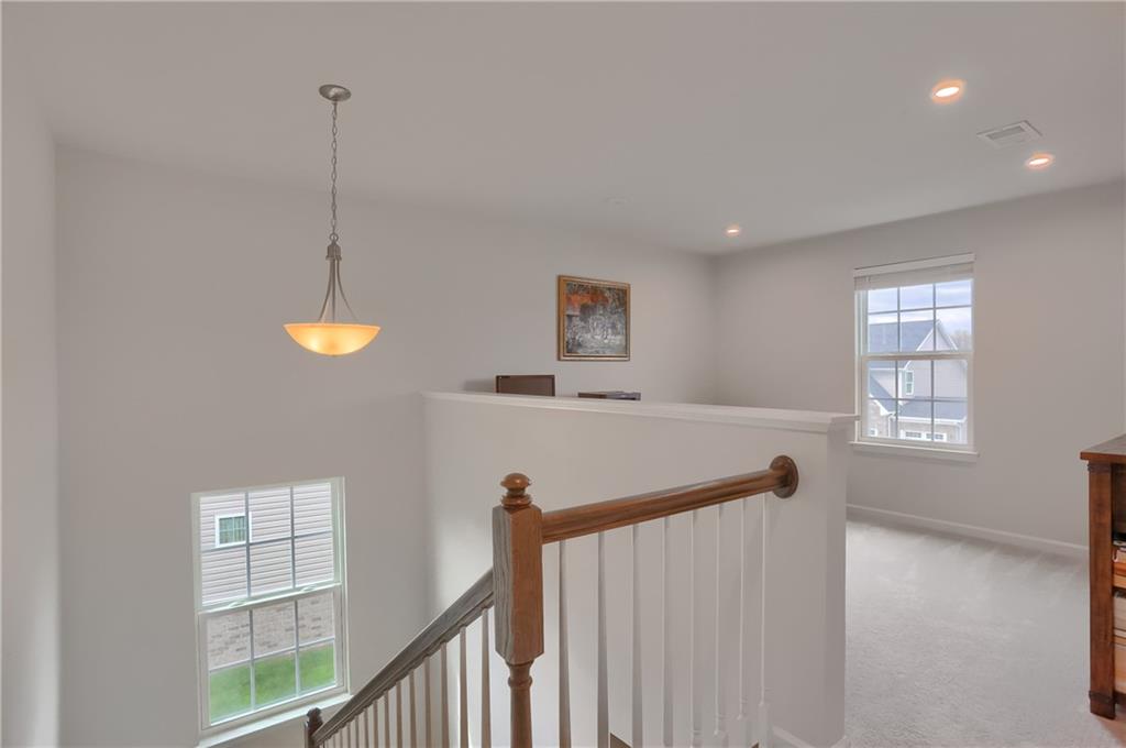 153 Piatt Estates Drive Washington, PA 15301 - Photo 22 of 50 At top of stairs, you will find cozy loft area that could serve as game room, den area, or reading nook