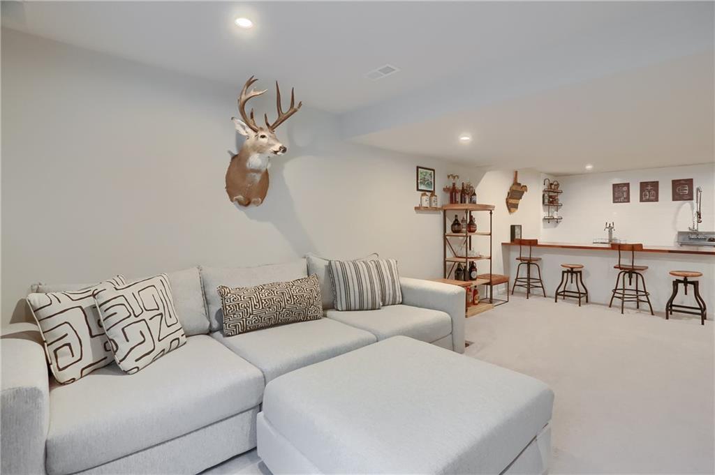 153 Piatt Estates Drive Washington, PA 15301 - Photo 40 of 50 Finished LL has great gathering space w/full bath, bar, living area, and storage