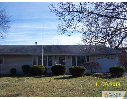 4 Pelham Road Kendall Park, NJ 08824 - Photo 1 of 1 a front view of house with yard