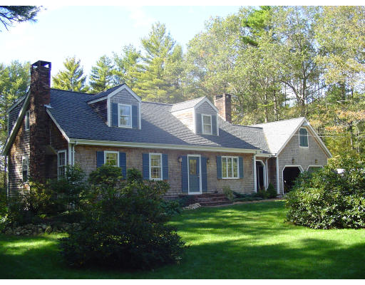 11 Randall Road Rochester, MA 02770 - Photo 1 of 11 a front view of a house with a garden