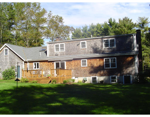 11 Randall Road Rochester, MA 02770 - Photo 2 of 11 a front view of house with yard and green space