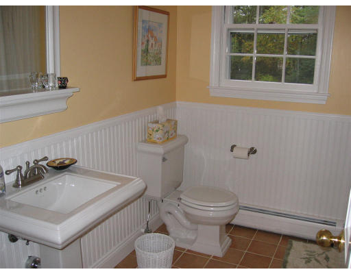 11 Randall Road Rochester, MA 02770 - Photo 7 of 11 a bathroom with a sink a toilet and a window