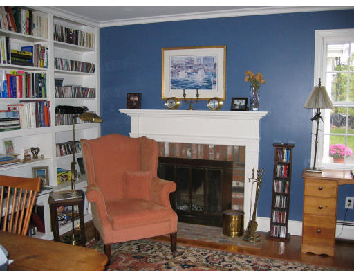 11 Randall Road Rochester, MA 02770 - Photo 9 of 11 a living room with furniture and a fireplace