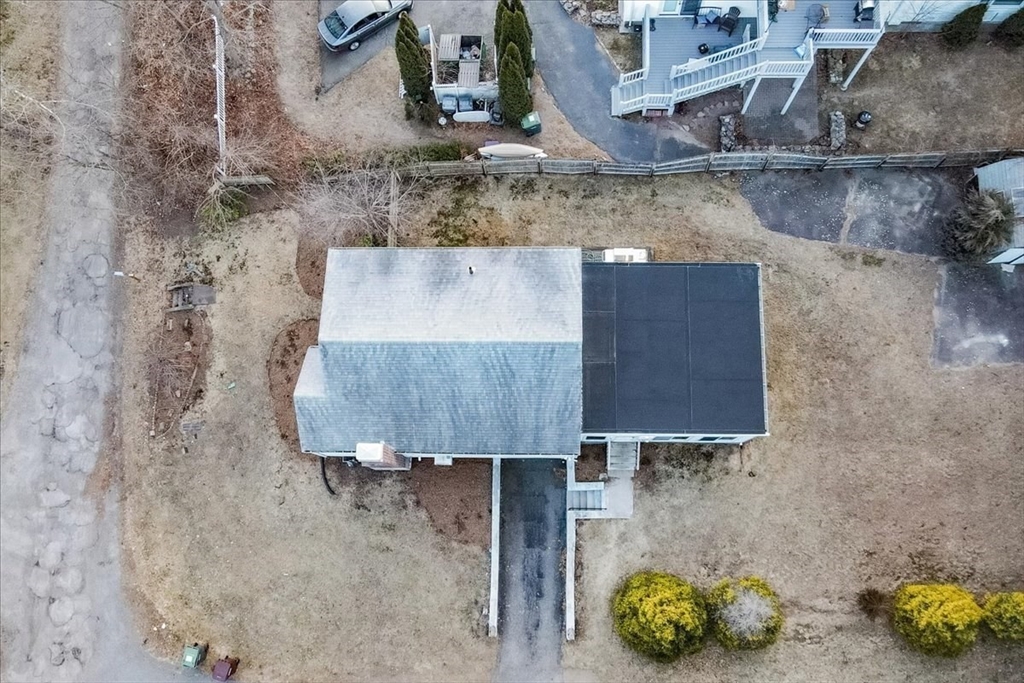 33 Kensington Road Dedham, MA 02026 - Photo 28 of 31 an aerial view of a house with a backyard