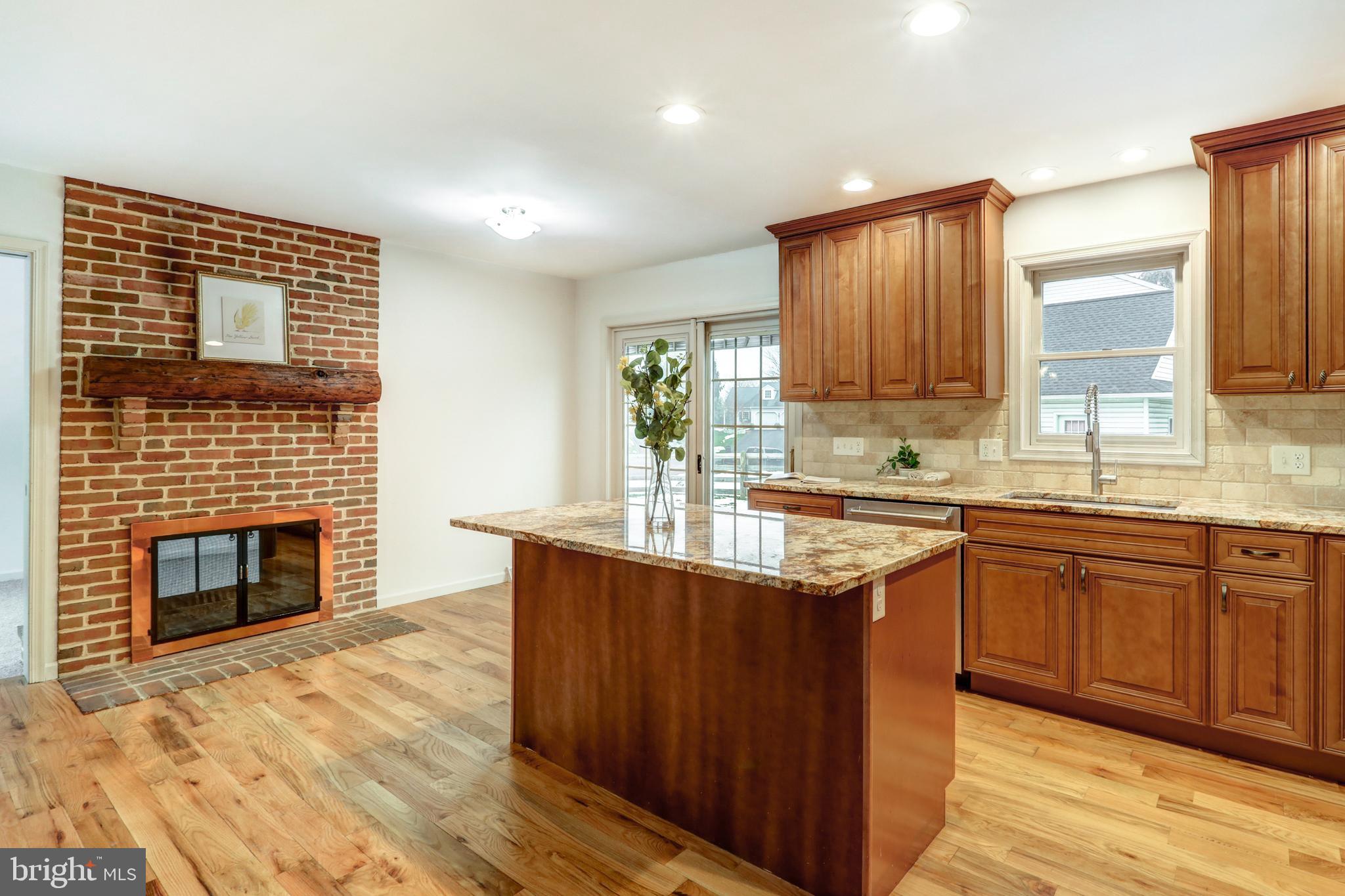 152 Kings Gate Drive Lititz, PA 17543 - Photo 13 of 45 a kitchen with stainless steel appliances granite countertop a stove sink and cabinets