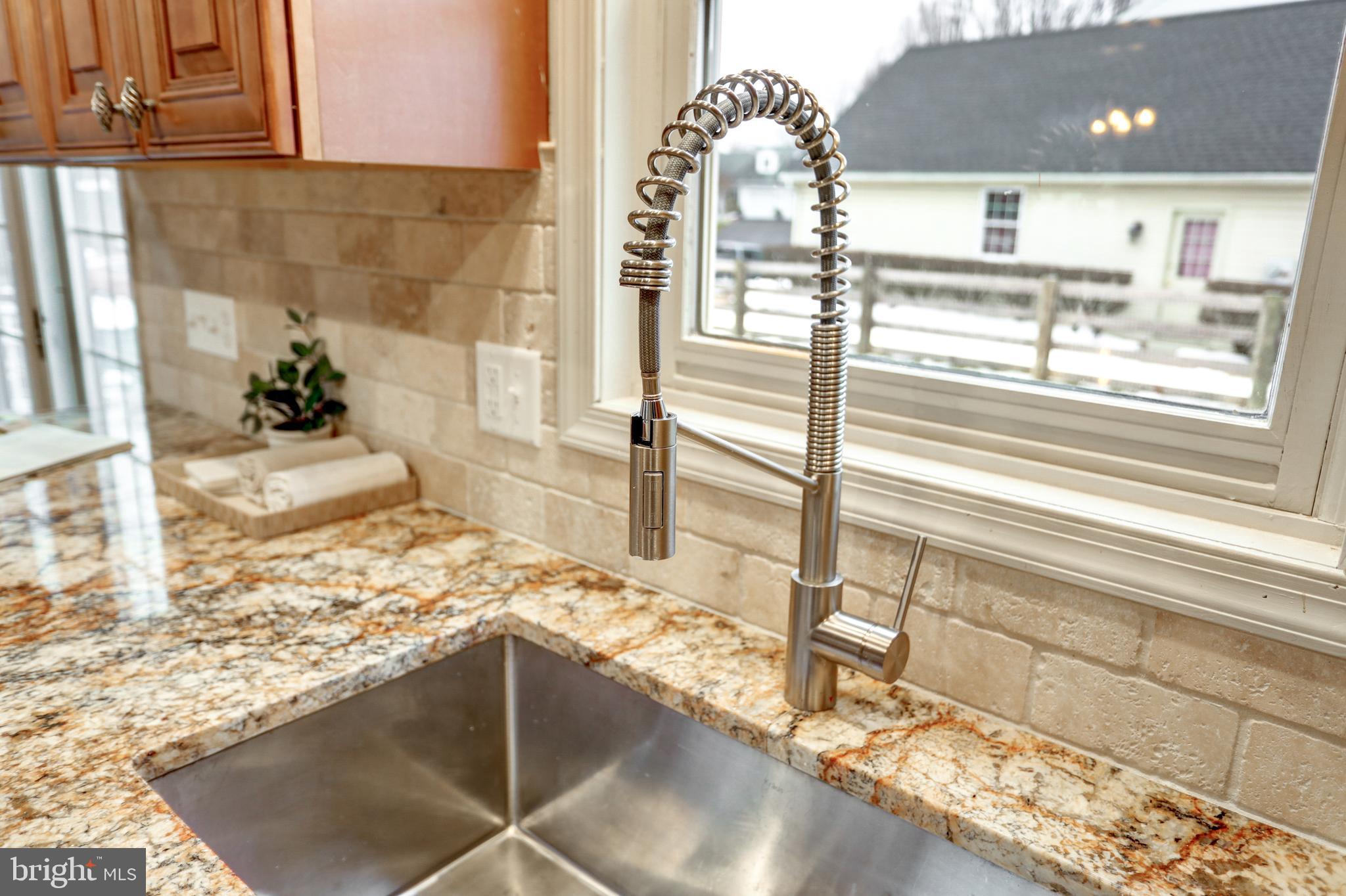 152 Kings Gate Drive Lititz, PA 17543 - Photo 14 of 45 a kitchen with a faucet and cabinets