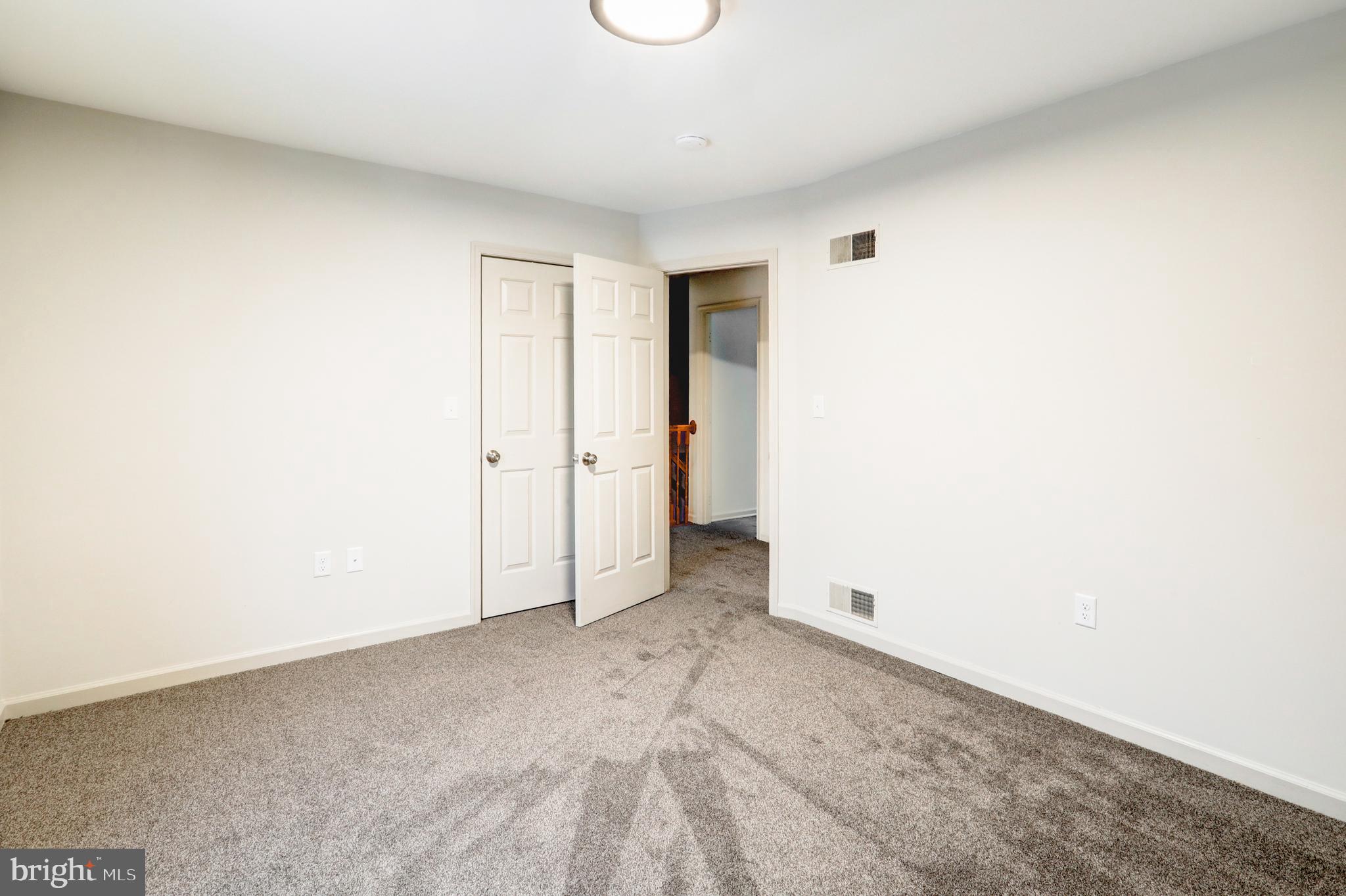 152 Kings Gate Drive Lititz, PA 17543 - Photo 27 of 45 an empty room with an entryway