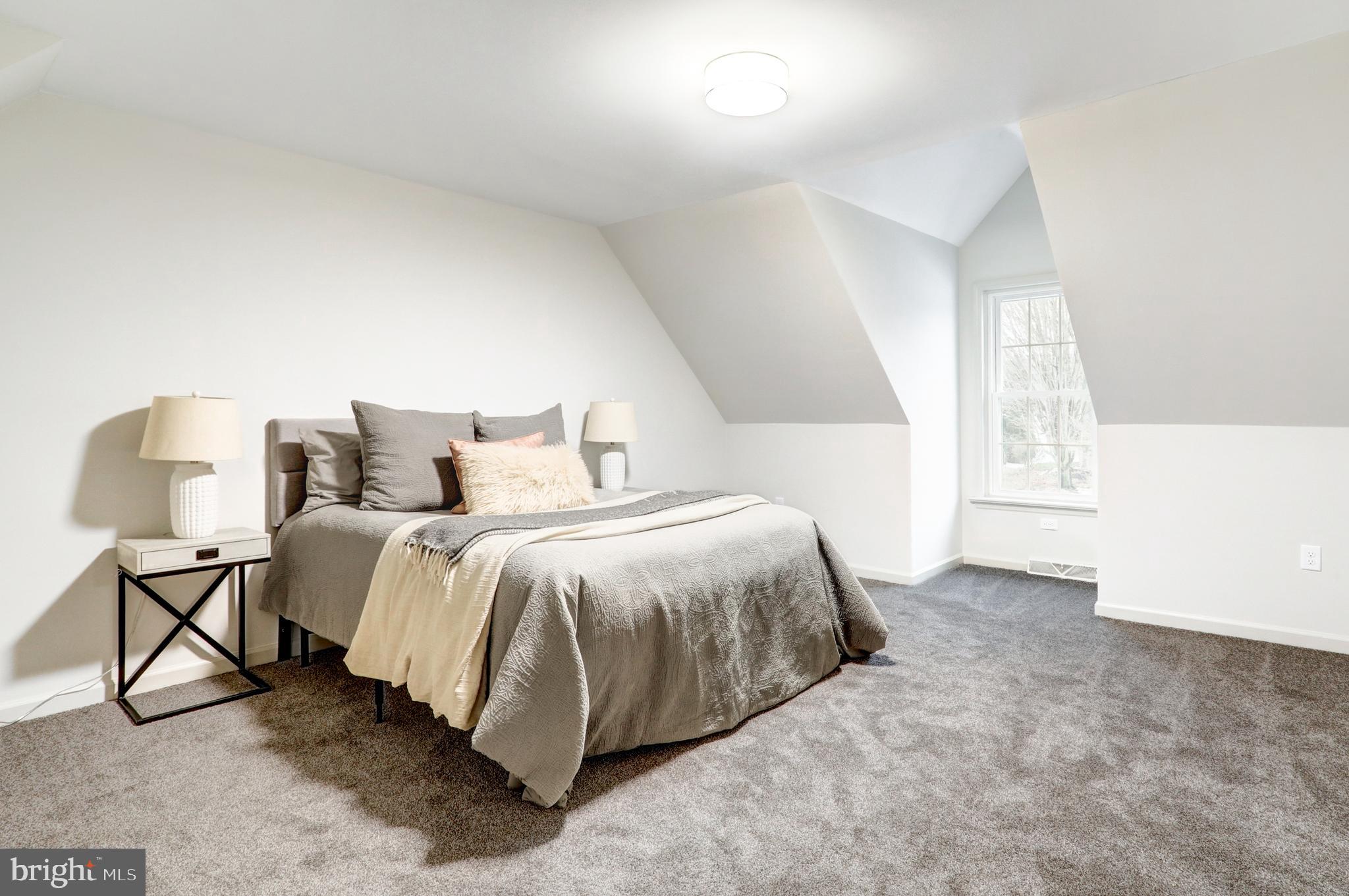 152 Kings Gate Drive Lititz, PA 17543 - Photo 31 of 45 a spacious bedroom with a bed and a window