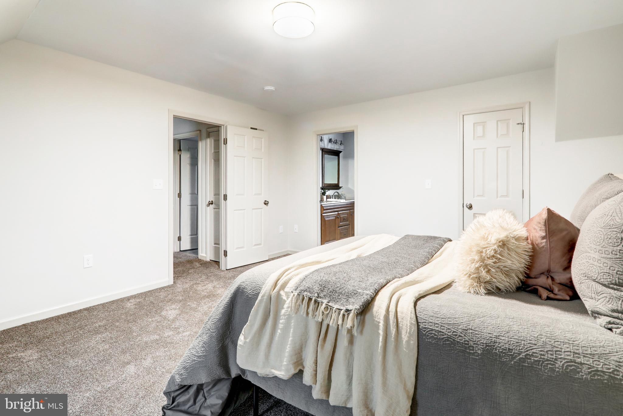 152 Kings Gate Drive Lititz, PA 17543 - Photo 32 of 45 a bedroom with a bed and closet