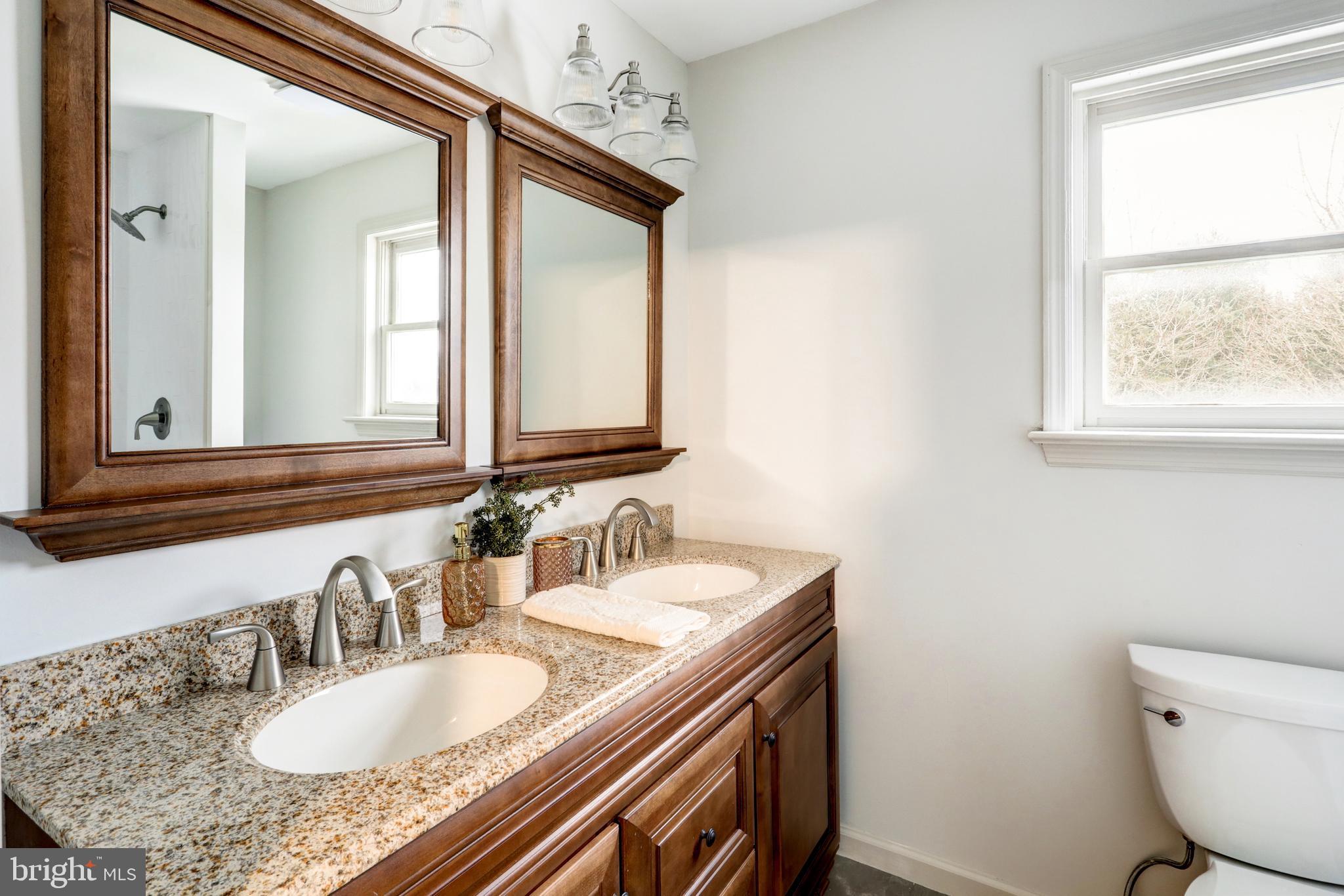152 Kings Gate Drive Lititz, PA 17543 - Photo 33 of 45 a bathroom with a granite countertop double vanity sink and a mirror