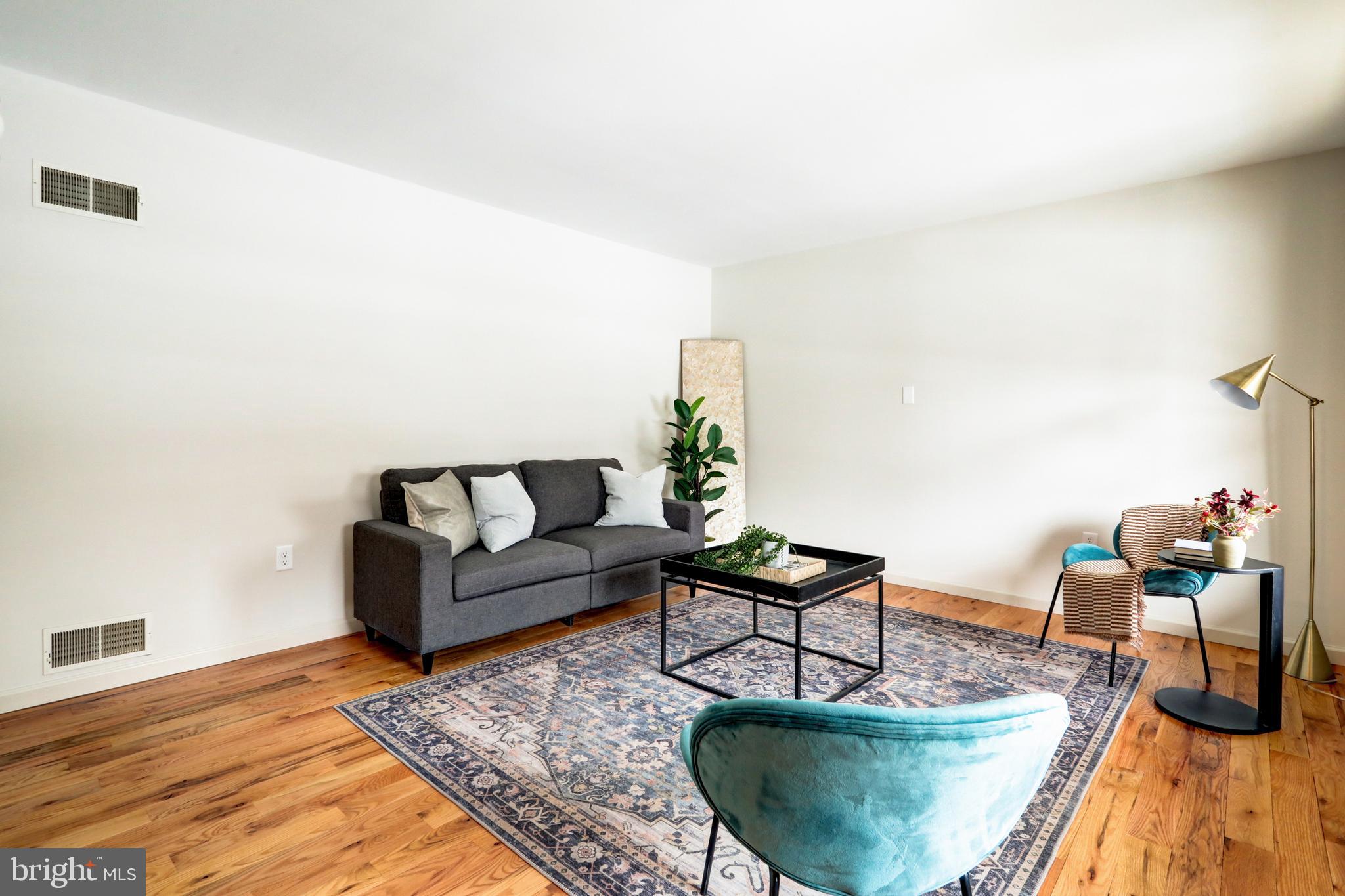 152 Kings Gate Drive Lititz, PA 17543 - Photo 4 of 45 a living room with furniture and a wooden floor