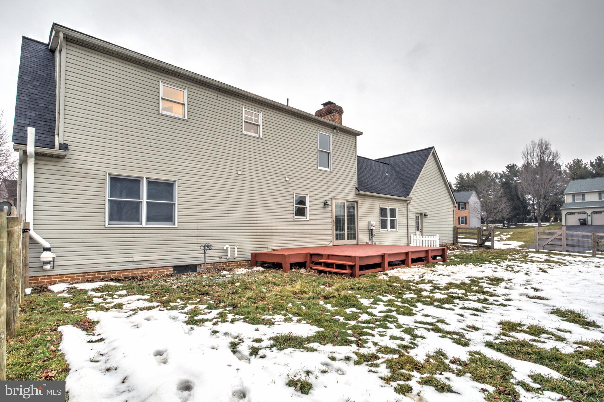 152 Kings Gate Drive Lititz, PA 17543 - Photo 43 of 45 a front view of a house with a yard covered with snow