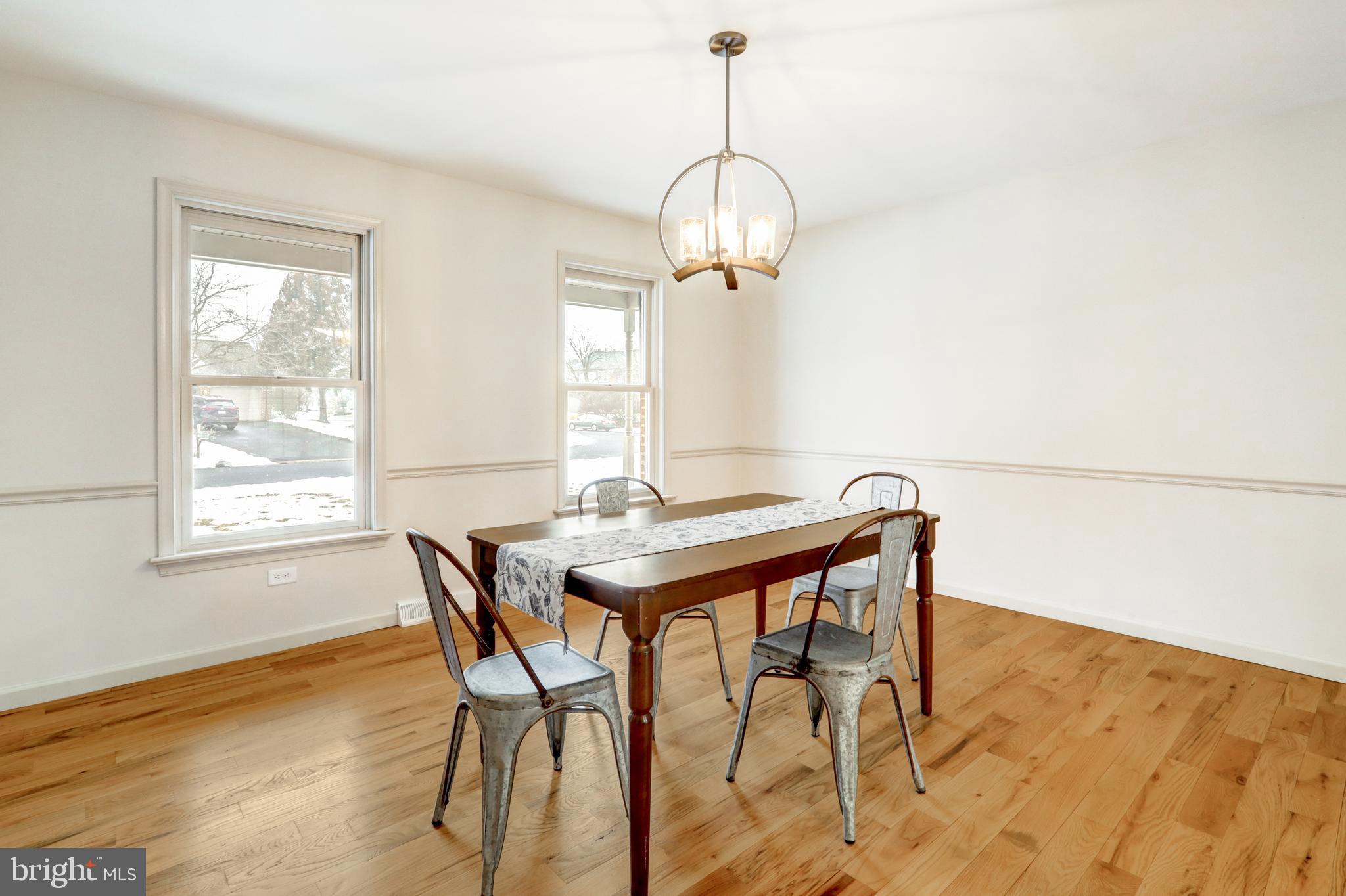 152 Kings Gate Drive Lititz, PA 17543 - Photo 6 of 45 a view of a dining room with furniture window and wooden floor
