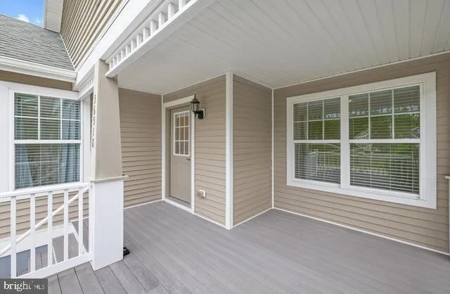 a view of a house with a large window