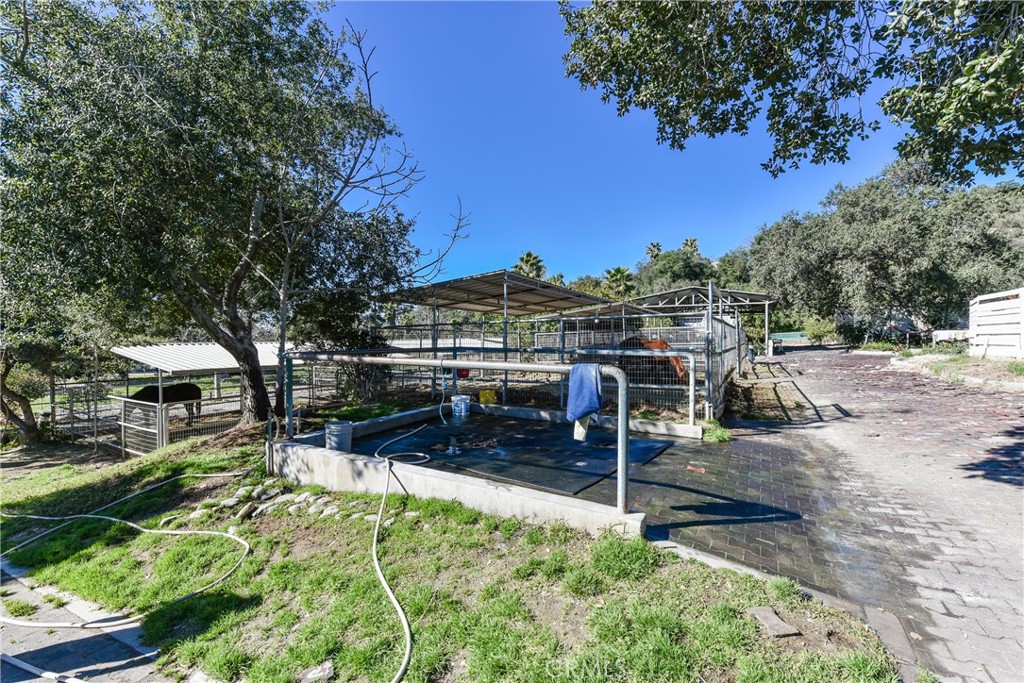 99 Bliss Canyon Road Bradbury, CA 91008 - Photo 20 of 49 a view of a swimming pool with a patio