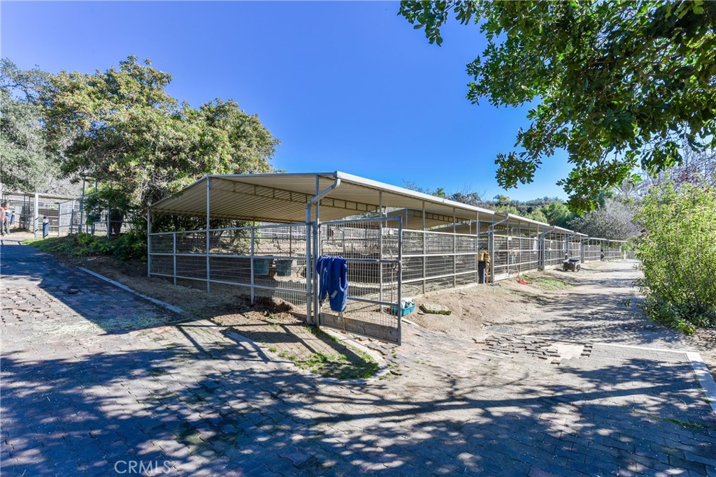 99 Bliss Canyon Road Bradbury, CA 91008 - Photo 22 of 49 a view of a yard with wooden fence