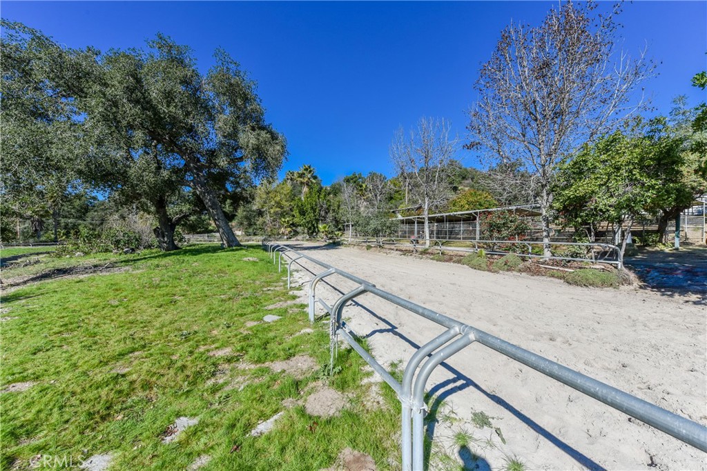 99 Bliss Canyon Road Bradbury, CA 91008 - Photo 25 of 49 a view of a street with a yard