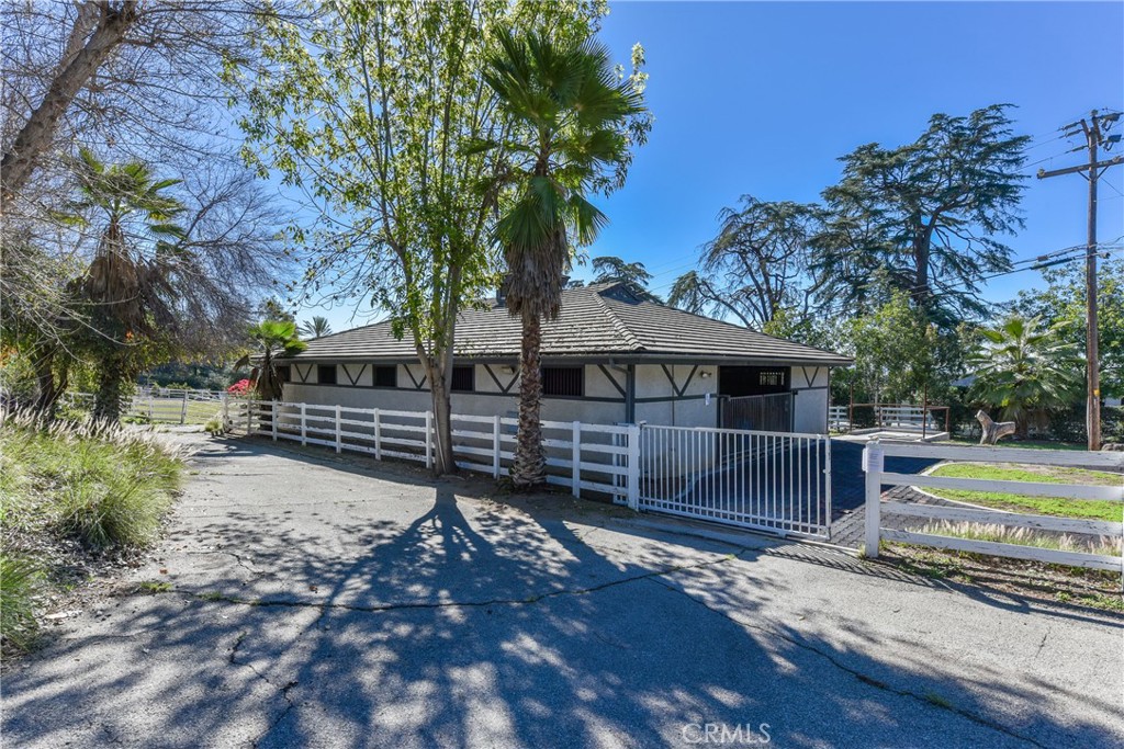 99 Bliss Canyon Road Bradbury, CA 91008 - Photo 28 of 49 a front view of a house with garden