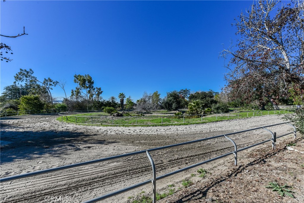 99 Bliss Canyon Road Bradbury, CA 91008 - Photo 31 of 49 a view of a yard with wooden fence