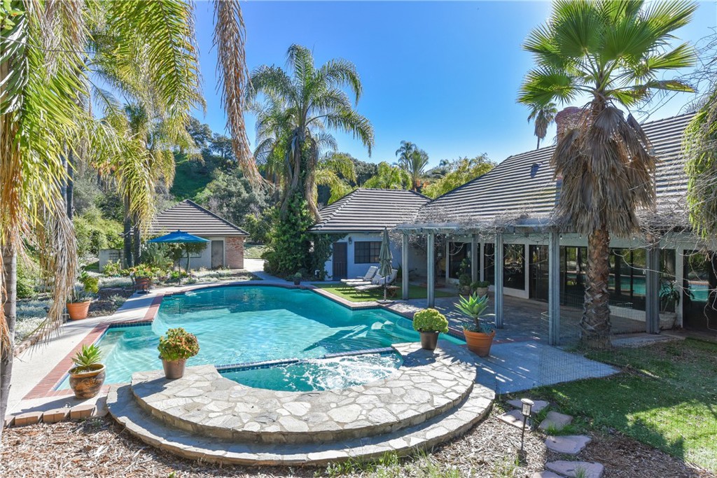 99 Bliss Canyon Road Bradbury, CA 91008 - Photo 9 of 49 a view of a house with swimming pool