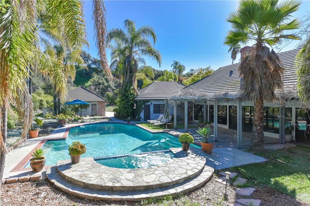 99 Bliss Canyon Road Bradbury, CA 91008 - Photo 10 of 49 a view of a house with swimming pool
