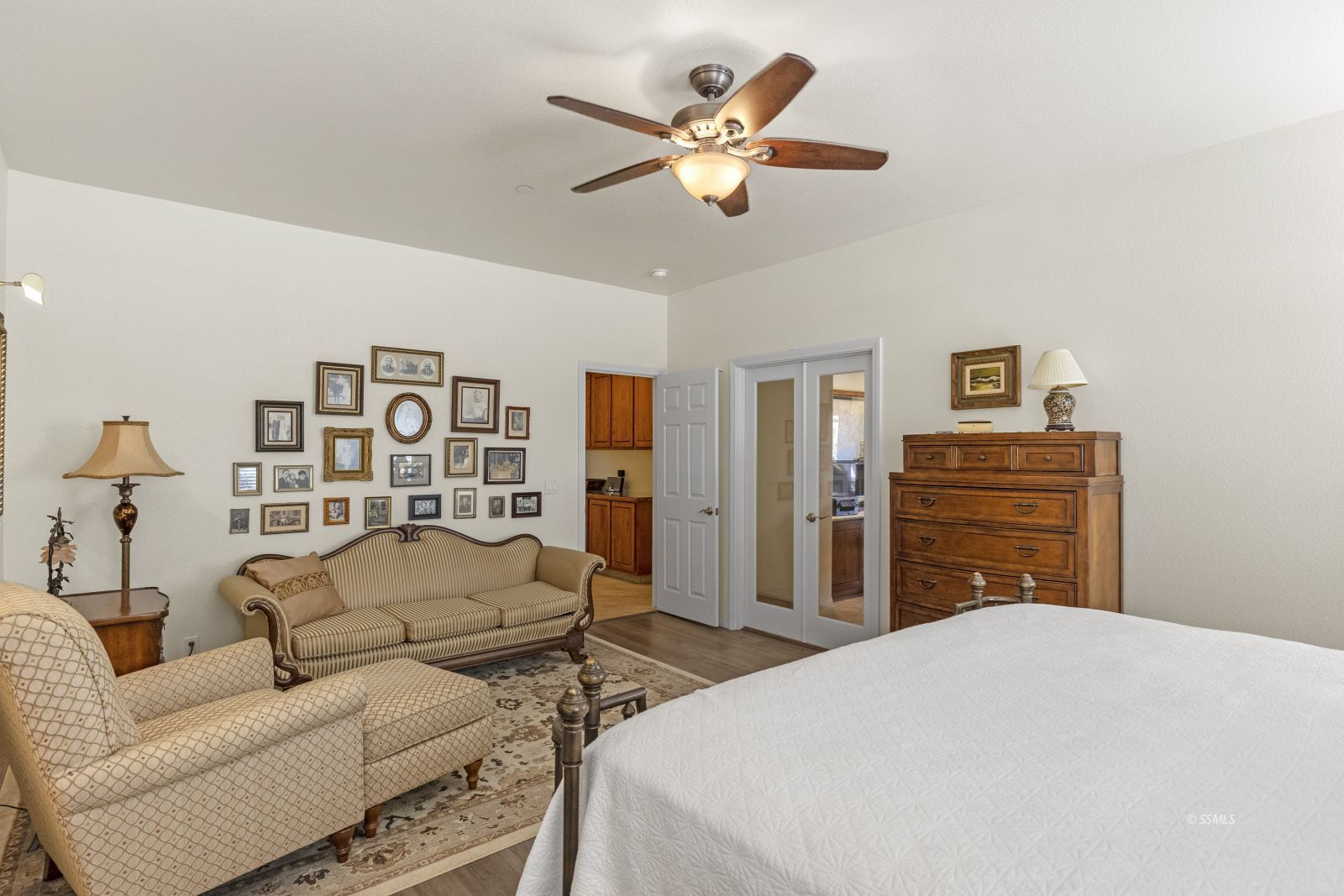 420 Scott Street Ridgecrest, CA 93555 - Photo 26 of 50 a bed room with a bed and a ceiling fan