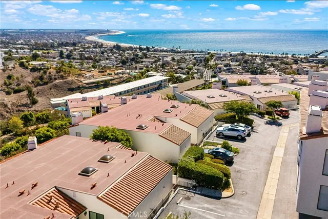 an aerial view of a house with a garden