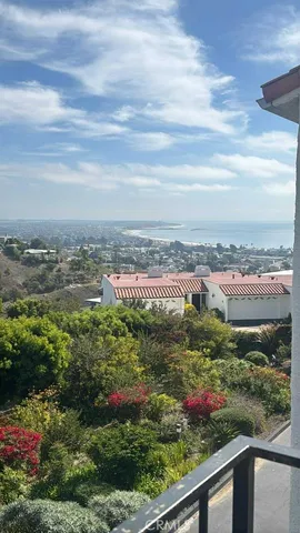 a view of a city and ocean