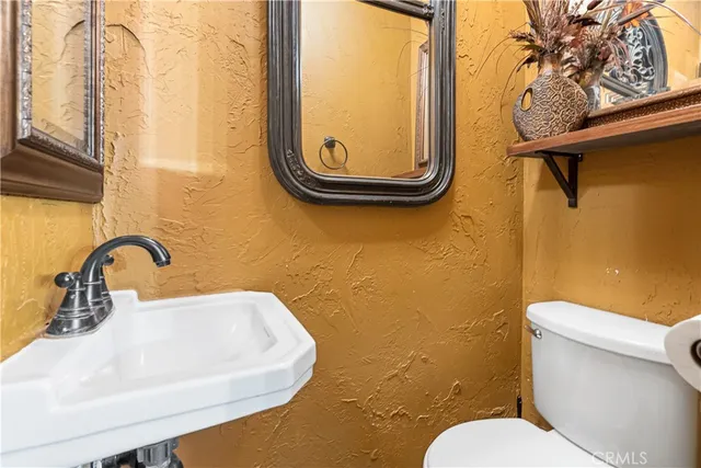 an aerial view of residential houses and outdoor space