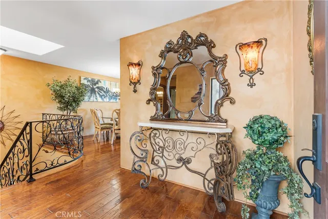 a view of a entryway door with wooden floor