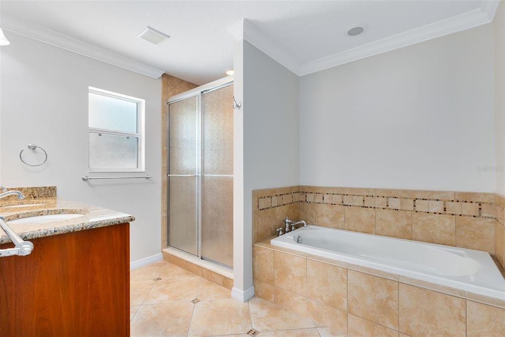 111 Variety Tree Circle Altamonte Springs, FL 32714 - Photo 27 of 35 These spacious retreats feature private en suite bathrooms and generous walk-in closets.