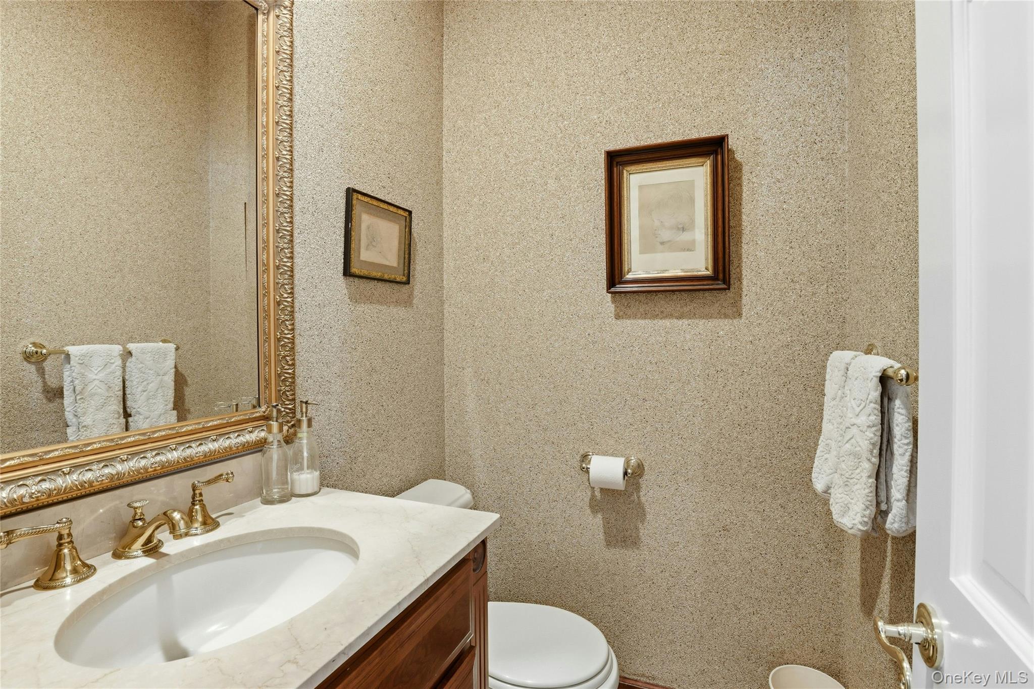 78 Hidden Ridge Drive Syosset, NY 11791 - Photo 9 of 21 a bathroom with a sink mirror and toilet